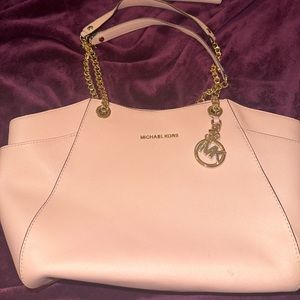 Rose pink Michael Kors bag with gold accents